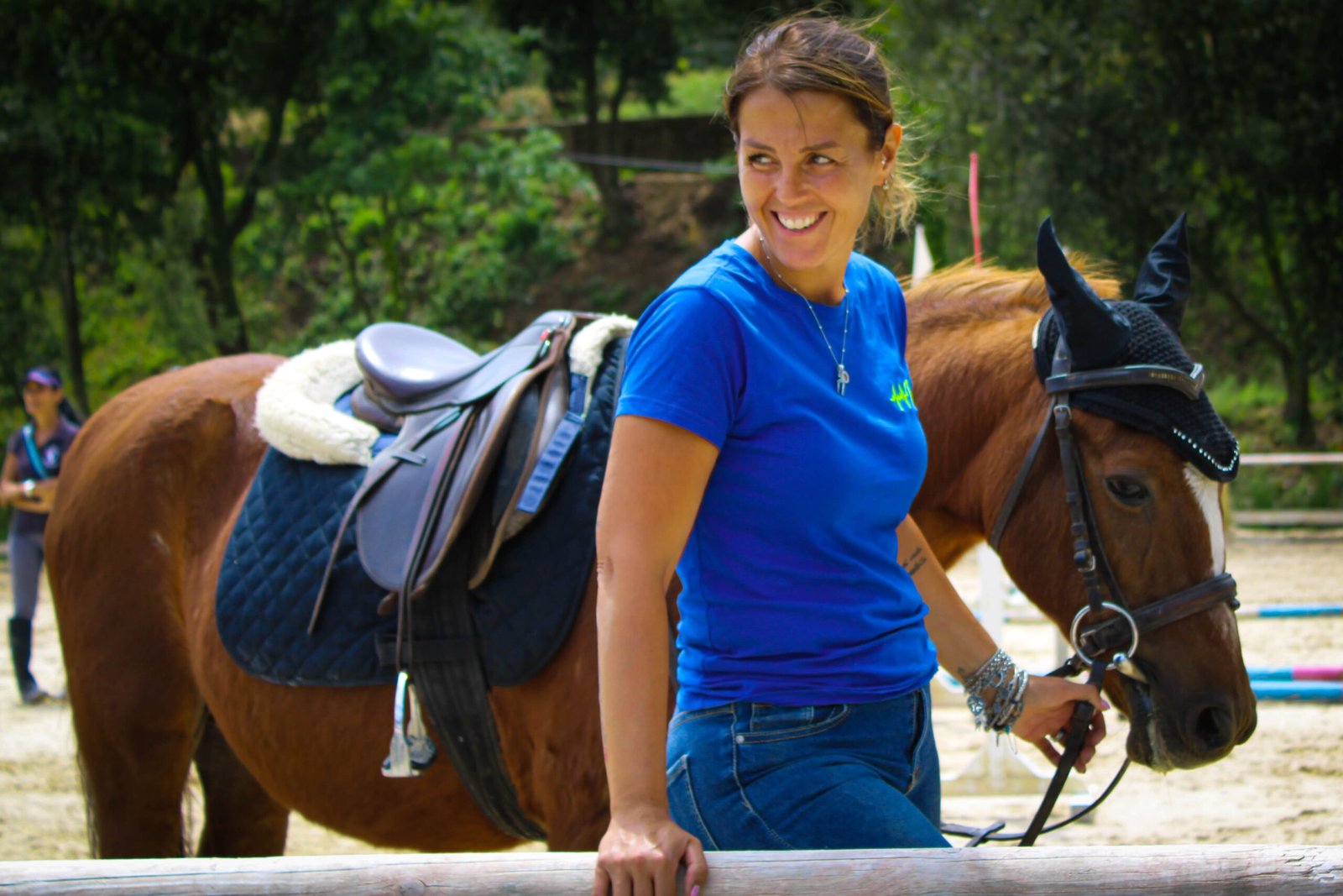 teresa con cavallo durante una gara